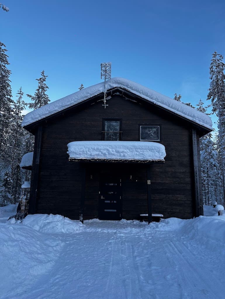 Private entrance to Snow & Pine cabin, deep snow, Levi