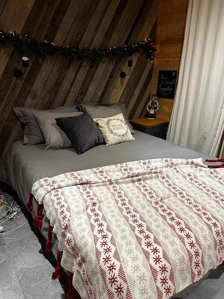 A bedroom dressed in warm Scandinavian textiles