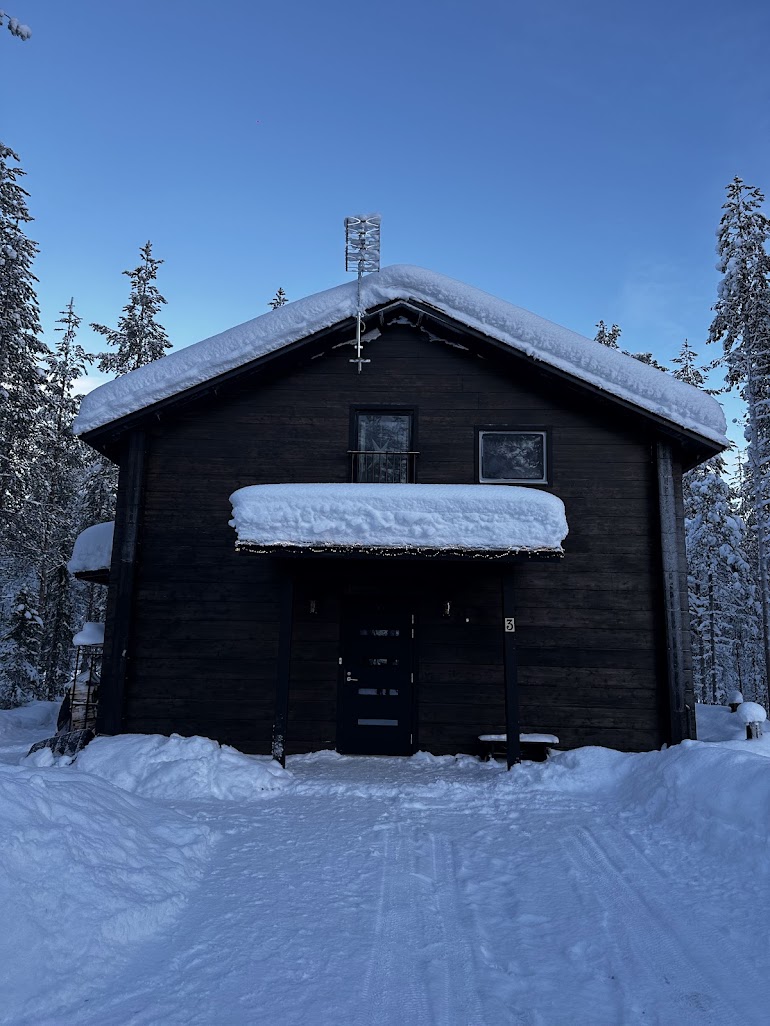 Private entrance to Snow & Pine cabin, deep snow, Levi